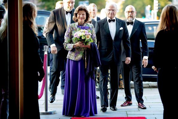  Queen Silvia is wearing sequin blazer and pleated maxi skirt