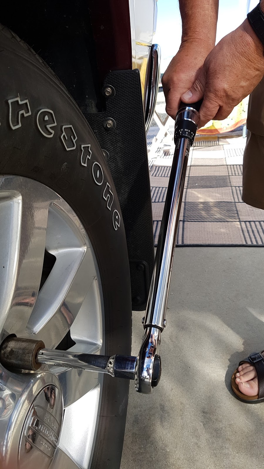 Torquing the wheels on your RV and tow vehicle.