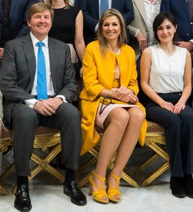 Queen Máxima wears NATAN Marigold Coat. King Willem-Alexander and Queen Maxima held a lunch at Hague Noordeinde Palace in the Hague