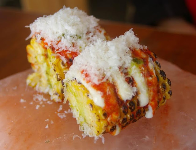 charred corn with parmesan on top; tapas, mt martha; east charred corn with parmesan on top; tapas, mt martha; east