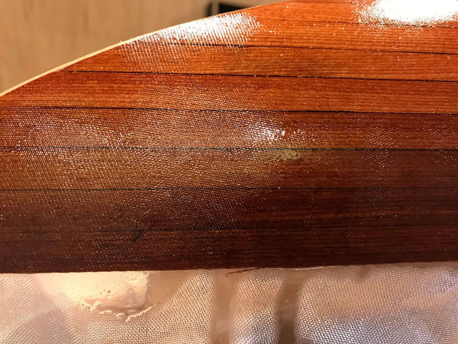 The Magic of Fiberglassing a Wooden Hull