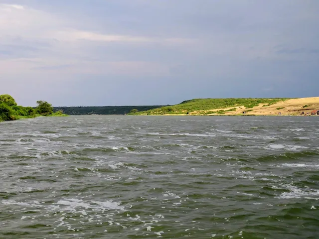 Turbulent waters of the Kazinga Channel in Uganda where is meets the lake