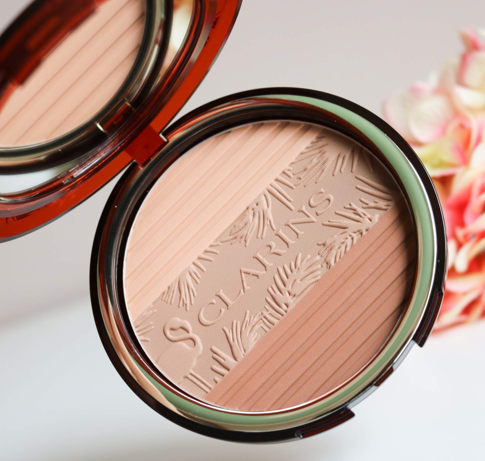 бронзер кларанс лимитка. бронзирующая пудра эсте лаудер. Clarins bronzing compact powder limited edition. бронзер milani silky matte bronzing powder. бронзер сухой.