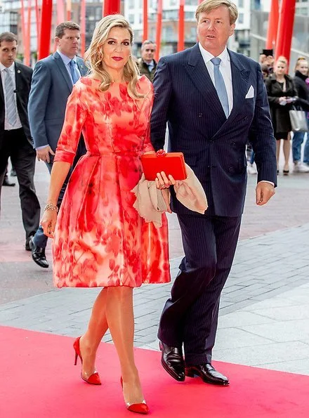 Queen Maxima's outfit is from the fashion house Natan floral print dress. President Michael Higgins and Sabina Higgins