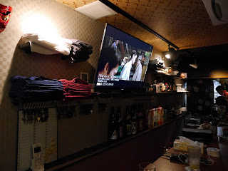 The very laid back lounge at Zakoza Bulge Bar, a gay fundoshi bar in Osaka. Zakoza Bulge Bar lounge, for gay guys into fundoshi loin cloths, Osaka, Japan.