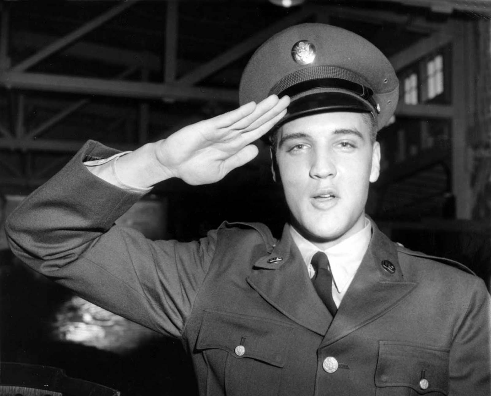 Presley salutes for a portrait during his tour of duty in Germany in February of 1959.