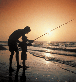 kid fishing with dad