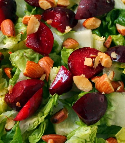 Salad of plums, almonds, and arugula