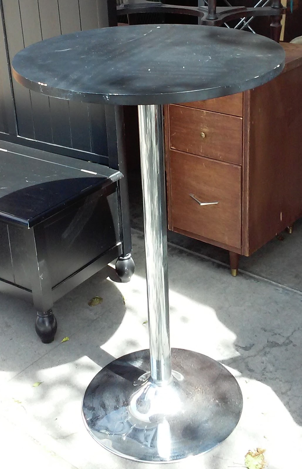 UHURU FURNITURE & COLLECTIBLES SOLD 39" Tall 2' Diameter Bistro Table