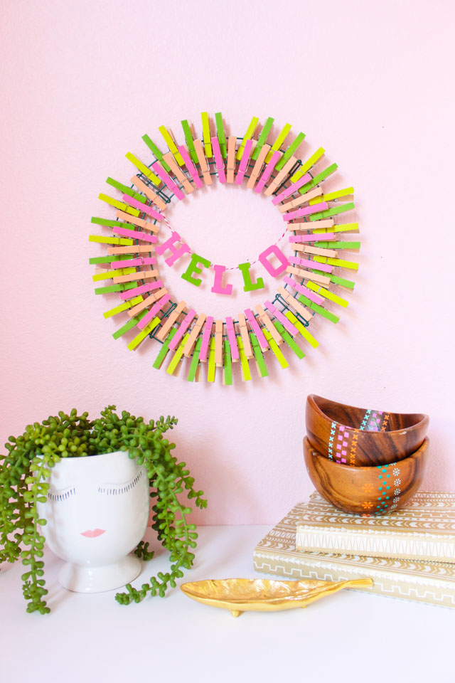 Hello Spring! This colorful DIY clothespin wreath is the perfect way to welcome spring to your home. #springwreath #clothespinwreath #clothespin #hellospring Hello Spring! This colorful DIY clothespin wreath is the perfect way to welcome spring to your home. #springwreath #clothespinwreath #clothespin #hellospring