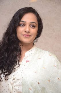nitya menon at 100 days of love audio launch nitya menon at 100 days of love audio launch