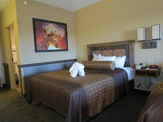 Kalahari's Desert room features two queen beds and a pullout sofa in a large room space for the entire family to stay.