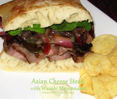 Asian Cheese Steaks With Wasabi Mayonnaise - Who doesn't love a Philly Cheese Steak, right? I was looking for a way to mix it up a little, so I decided to add an Asian twist to this classic cheese steak and this is the end result.