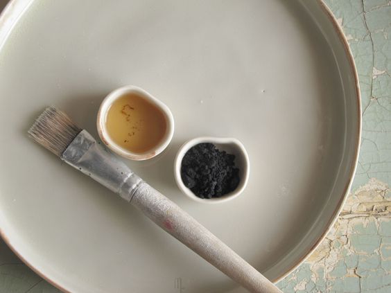 Paintbrush and colors on stoneware - Slow living inspiration with calm, serene, quiet living - found on Hello Lovely Studio