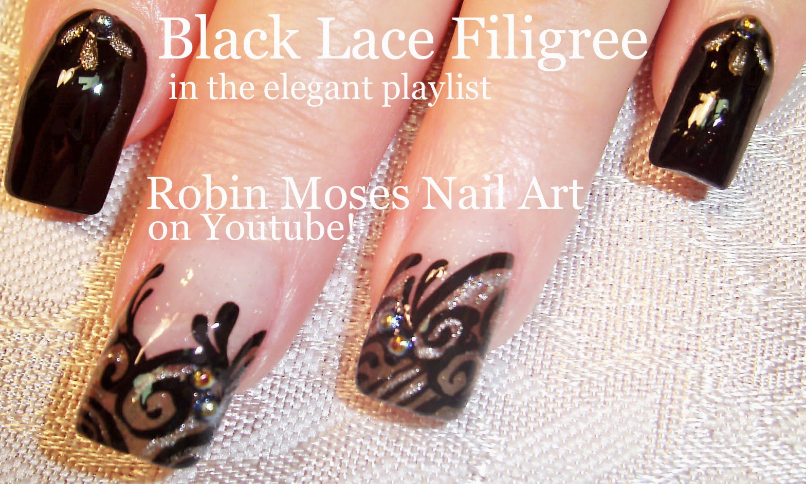 9. "Elegant Black and Lace Nail Design with Rhinestone Accents" - wide 1