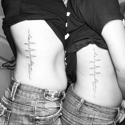 Estes frequência cardíaca irmã tatuagens