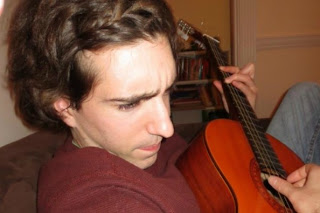 Jeff Bauman playing guitar