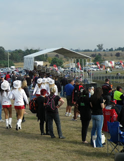 CROWD AT THE CAR RACES
