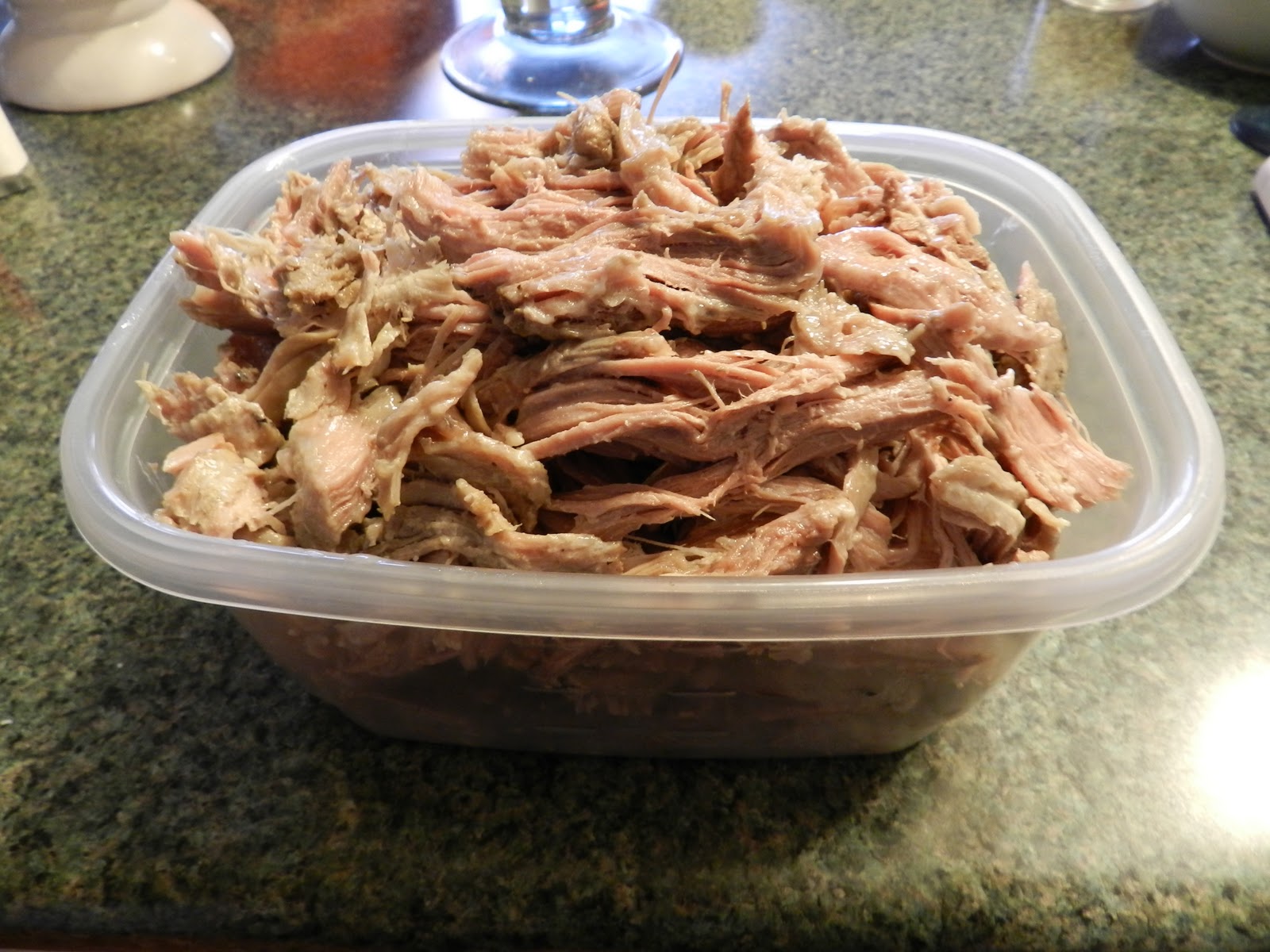 Iconic Dinosaur BBQ's succulent pulled pork with signature sauce.