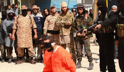 Militants of ISIS execute two Syrian men on charges of leaking information to Syrian rebels in Hasakah Militants of ISIS execute two Syrian men on charges of leaking information to Syrian rebels in Hasakah