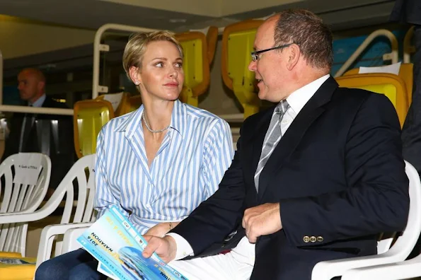 Prince Albert II and Princess Charlene attends the 34th International Swimming Meeting Mare Nostrum in Monte Carlo, Monaco. Princess Charlene of Style, Fashions