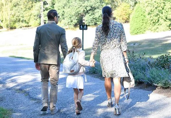 Crown Princess Victoria is wearing Baum und Pferdgarten skirt and blouse. Princess Estelle on the first school day