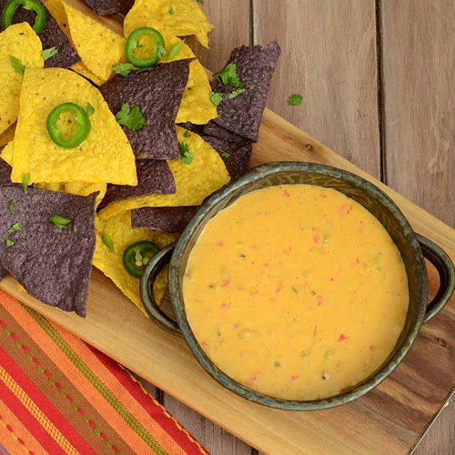 Pulled pork queso for nachos, BBQ queso, tailgate food, party food, best queso recipe