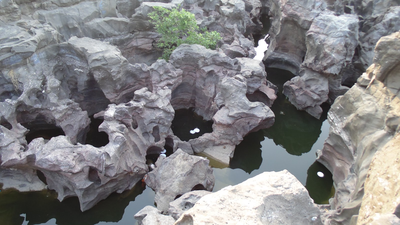 Nighoj village potholes (kund)on Kukadi river near pune