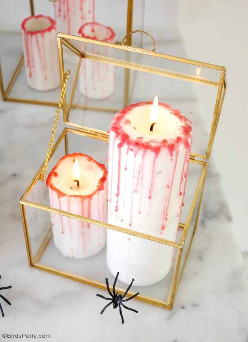 DIY Halloween Bloody Candles - great last-minute, quick and easy craft to help decorate any spooky table or room for a macabre, vampire vibe! by BirdsParty.com @birdsparty