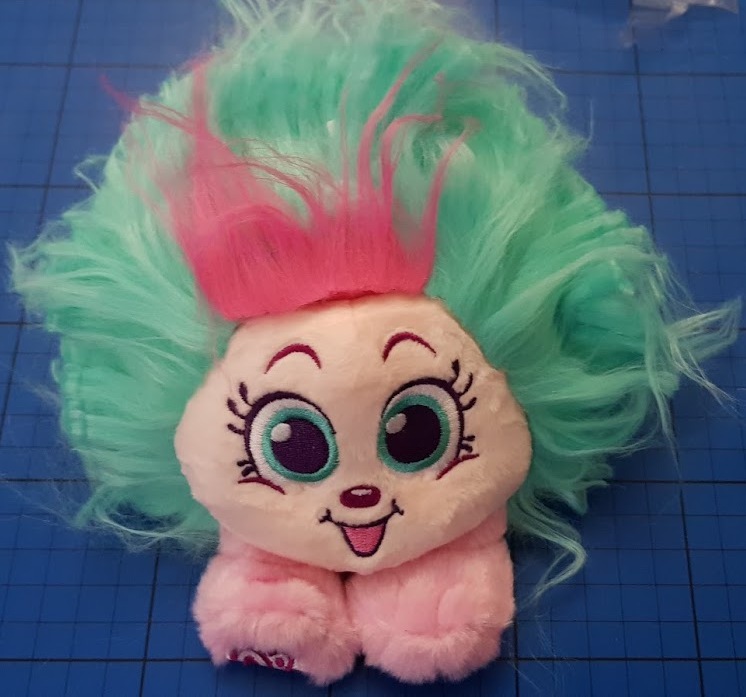little toy with crazy hair