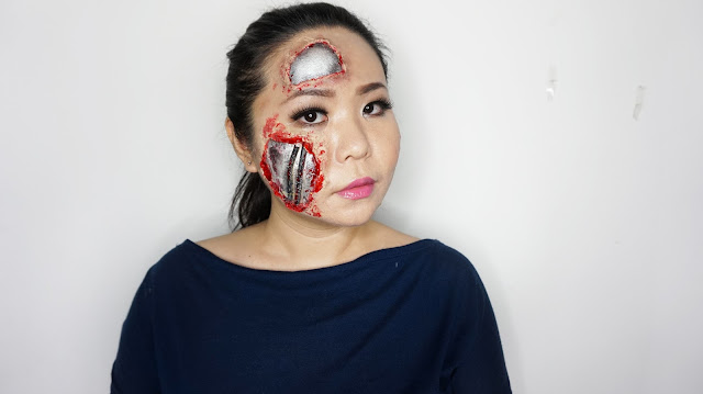 Robot SFX Makeup tutorial inspired by the terminator with things you find at home. In this tutorial, i will show you how to get the robotic metallic skin underneath your skin using face paint and a few house hold items.