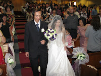 Mr Soon walking down the aisle with his daughter Cindy