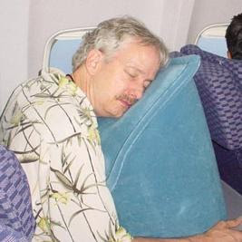almohada para dormir en el avion