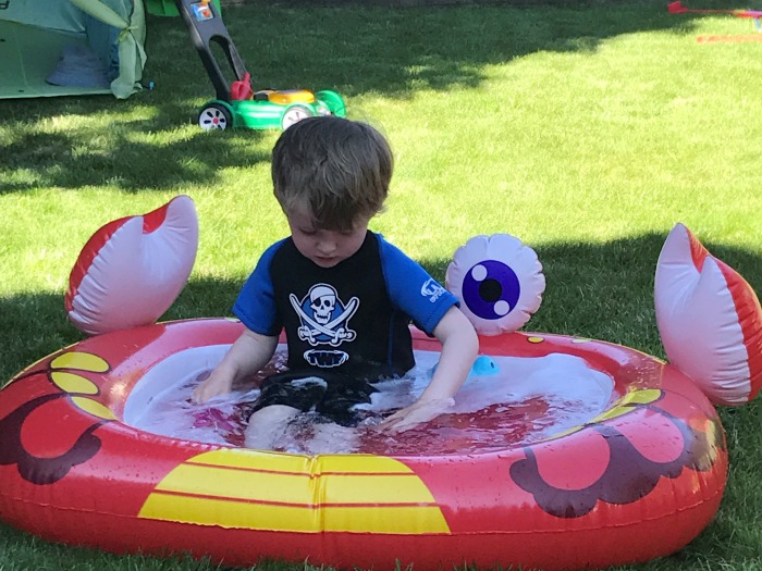 Squidge waiting for Daddy in the paddling pool