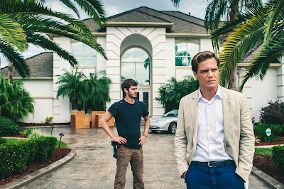 Michael Shannon and Andrew Garfield in 99 Homes