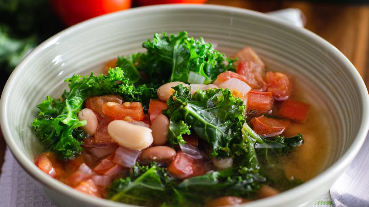 Hearty vegetarian  Kale Tomato Beans and Fennel Soup photo