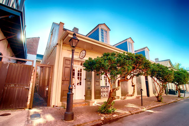 With a stay at Inn on Ursulines located near New Orleans' famed Bourbon Street immerse yourself in voodoo history at the historic cottage of Marie Laveau .
