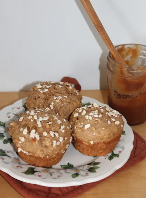 Plate of baked apple butter oatmeal muffins.