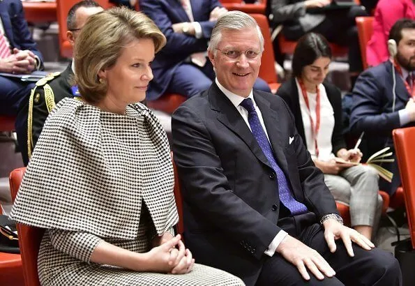 Queen Mathilde wore a floral-print crepe maxi dress by Dries van Noten. King Philippe and Queen Mathilde attended the briefing