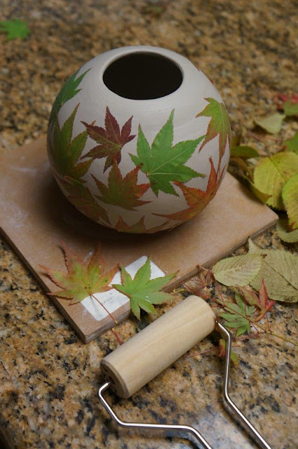 Beautiful leaf imprint ceramic pottery hand thrown vessel - in progress.