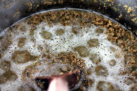 Decoction bubbling in a three gallon clad stock pot.