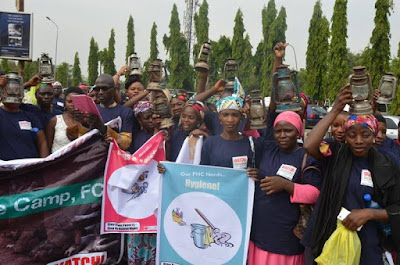 Abuja Residents Storm National Assembly With Lamps Over Lack Of Power Supply Nesi1