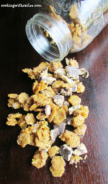 This Samoa Smacky Delicious Mix is sure to be your new favorite snack mix. It has all of the caramel, coconut, chocolate and shortbread flavors of your favorite Girl Scout Cookie in a highly delicious and addictive snack mix! #SundaySupper