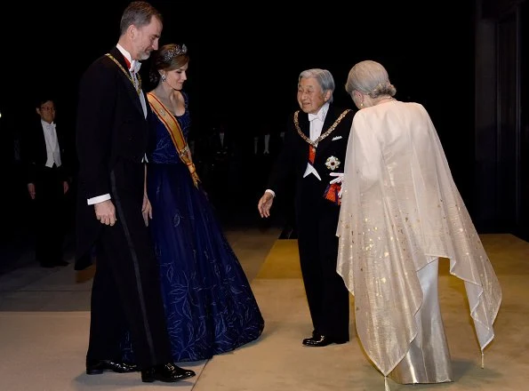 King Felipe VI and Queen Letizia attend the state banquet hosted by Japanese Emperor Akihito and Empress Michiko at the Imperial Palace. Letiza wore a navy blue gown and diamond tiara