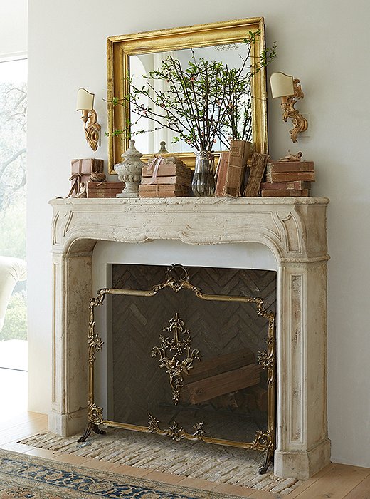 Beautiful modern farmhouse fireplace at Patina Farm...decor inspiration on Hello Lovely Studio