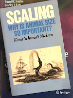 Scaling: Why is Animal Size so Important? by Knut Schmidt-Nielsen, superimposed on Intermediate Physics for Medicine and Biology.