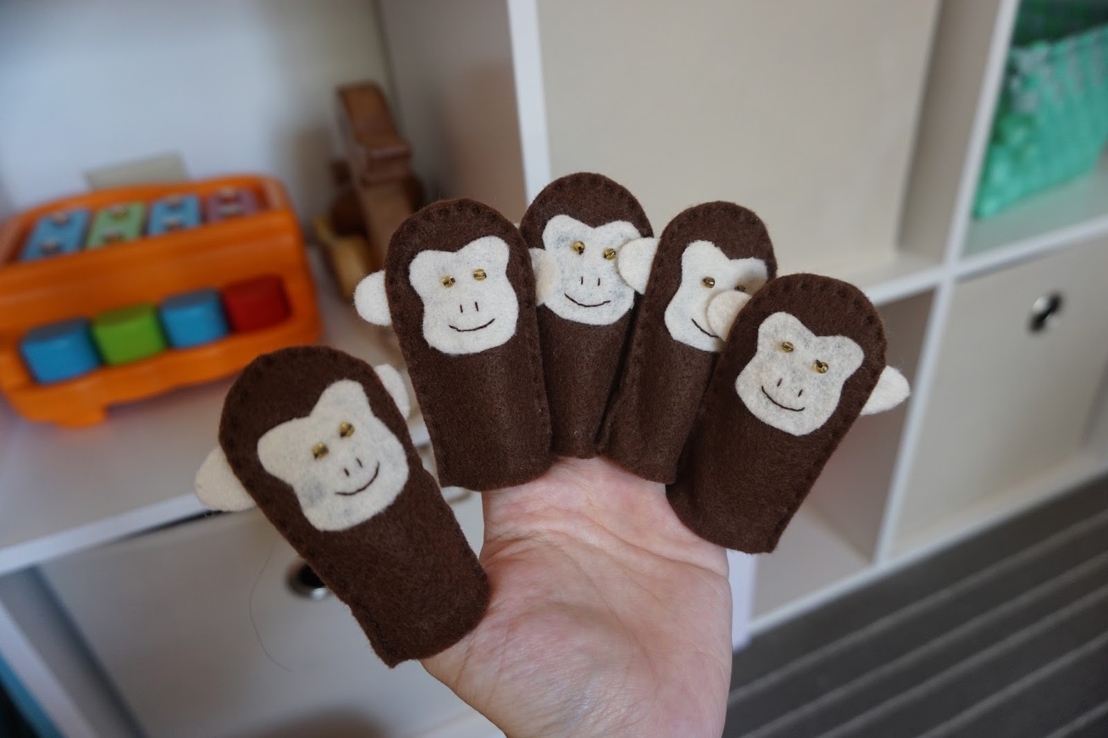 monkey toy that hangs on your finger