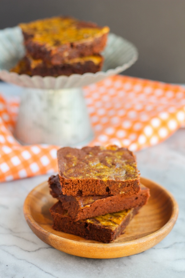 These thick, fudgey brownies with a rich and creamy pumpkin swirl are one of the BEST brownies ever! 