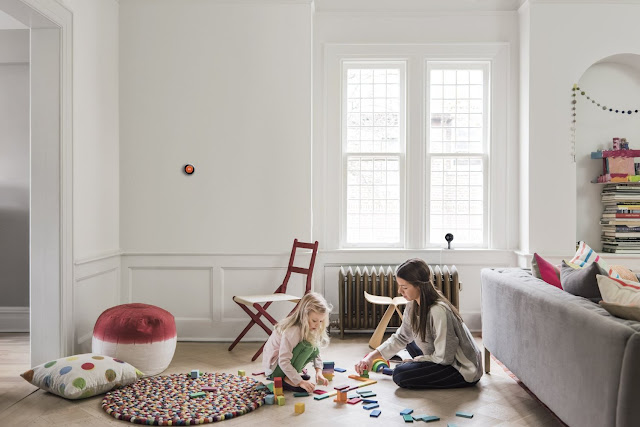 Nest Learning Thermostat in the room Nest Learning Thermostat in the room