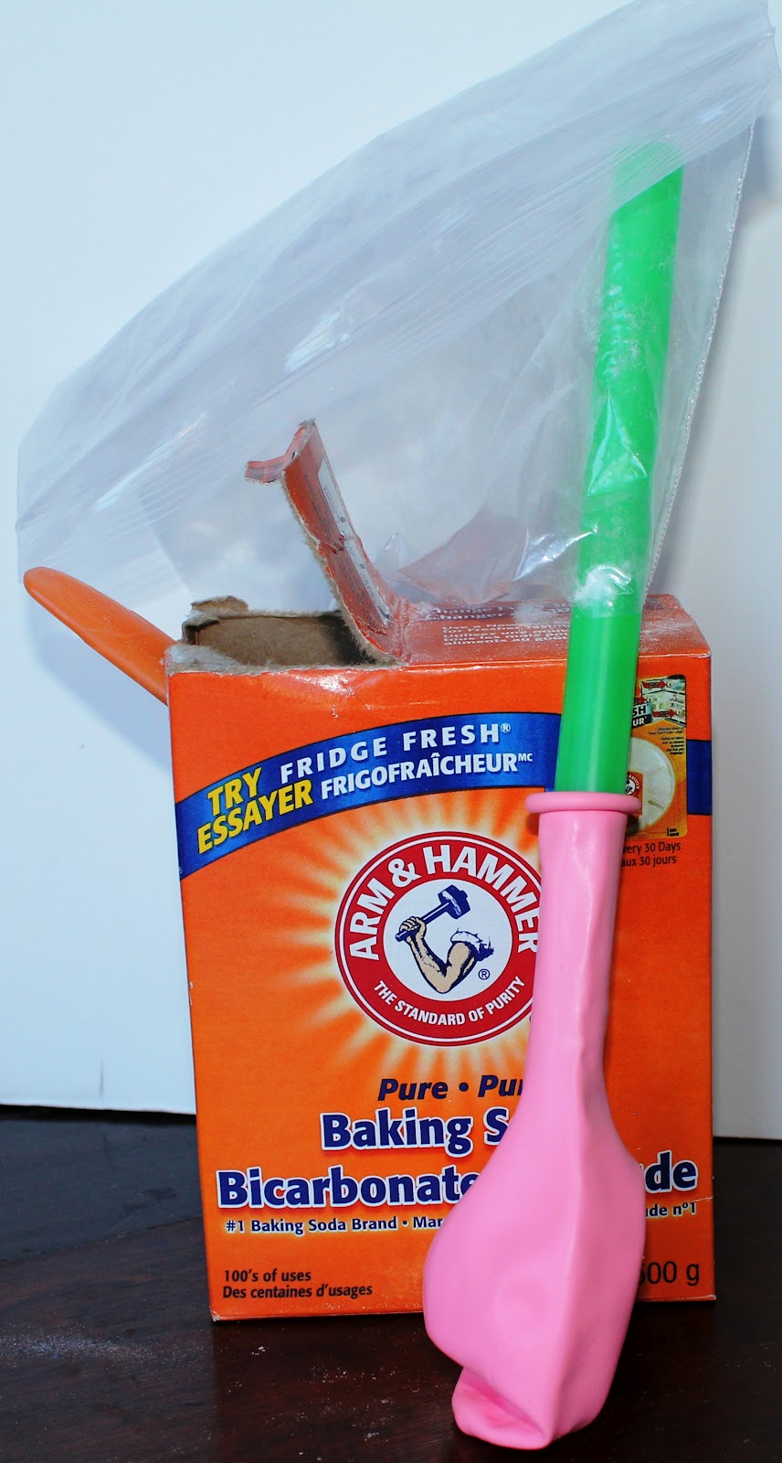 Once you have your balloon on top of the bottle it should look like this